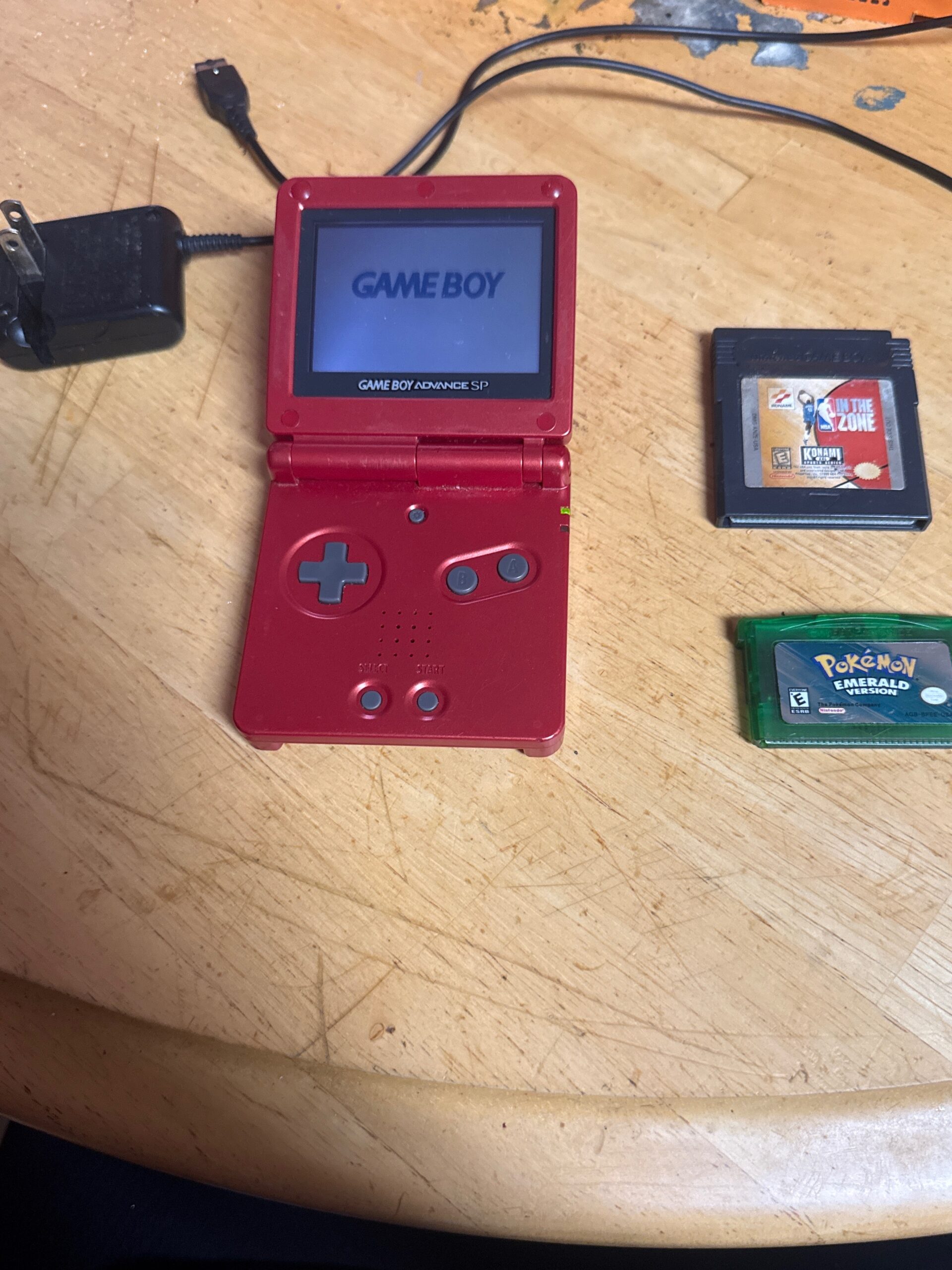 Gameboy Advance SP with NBA In The Zone Game and Pokémon Emerald Game